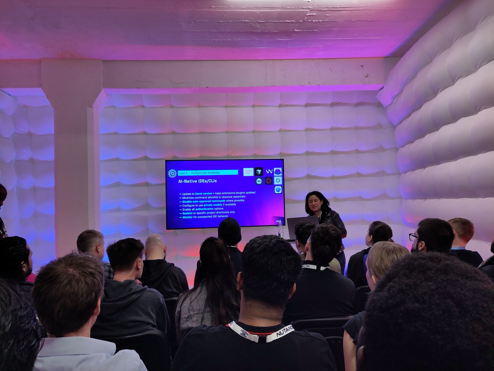 Snyk talk slide on configuration hardening for AI-native IDEs and CLIs